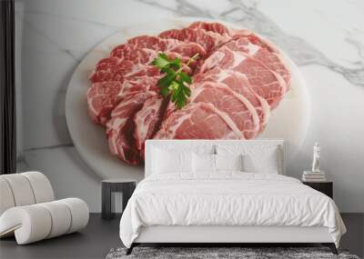 Fresh raw pork loin sliced into portions, detailed view, ready for cooking, marbled meat, clean kitchen setup Wall mural