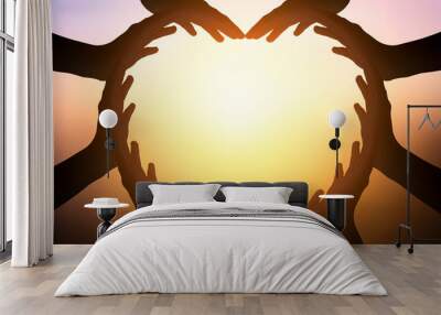 international day of friendship concept: hands in shape of heart on blurred background Wall mural