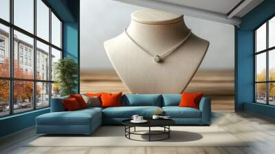 Overhead view of a beige mannequin bust showcasing a sleek silver pendant, white background with soft shadows, wooden stand, natural stone accents, clean 3D design, elegance Wall mural