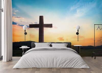 Religious concept: Jesus Christ wooden cross with dramatic lighting background Wall mural