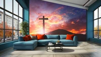 Silhouette the cross on sunset background Wall mural