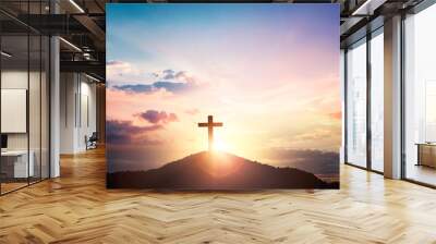 Silhouette wooden cross on mountain sunset background Wall mural