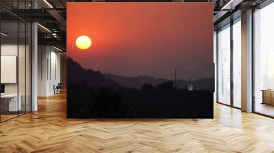 sunset over the mountains Wall mural