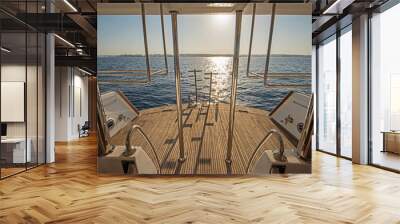 Ladders on the back wooden deck of a luxury motor yacht Wall mural