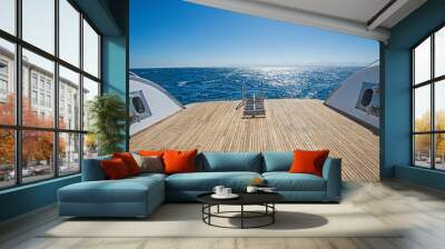 Ladders on the back wooden deck of a luxury motor yacht Wall mural