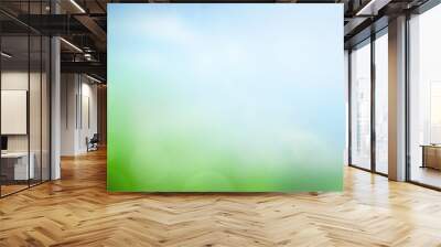 World Environment Day concept: blurred beautiful green nature with blue sky  background Wall mural