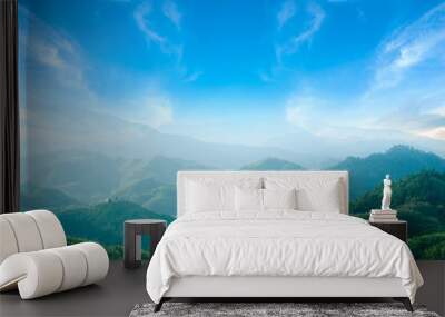 World environment day concept: Green mountains and beautiful blue sky clouds Wall mural