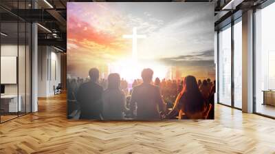 Worship concept:Silhouette people looking for the cross on  sunrise background Wall mural