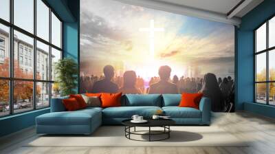 Worship concept:Silhouette people looking for the cross on  sunrise background Wall mural