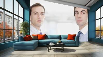 handsome young businessmen facing camera Wall mural