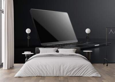 Black laptop on a dark clean table with a reflective surface Wall mural