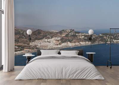 White houses between the mountains and the sea coast from above in Andalusia, Spain Wall mural