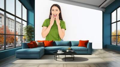 Attractive beautiful positive asian woman. Close up portrait of happy pretty nerd Japanese asia lady girl wearing green t shirt with smiling face isolated on white background. Excited wow young women Wall mural