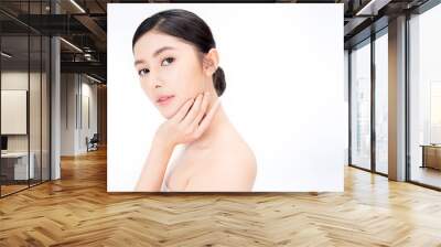 Closeup portrait of beauty asian woman with fair perfect healthy glow skin hand touching shoulder copy space, young beautiful asia girl with pretty smile on face. Beauty korean spa skincare banner Wall mural