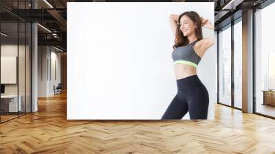 Portrait of beautiful healthy asian woman body with sport wear copy space on white background. People beauty perfect body slim fit fitness girl happy and relaxing. Freedom lifestyle healthcare concept Wall mural