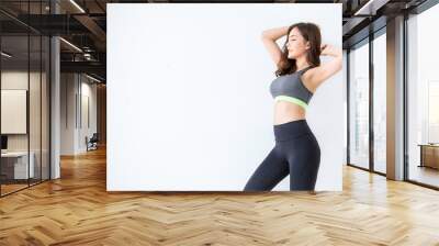 Portrait of beautiful healthy asian woman with sport wear copy space on white background. People beauty perfect body slim fit fitness sexy girl happy and relaxing. Freedom lifestyle healthcare concept Wall mural