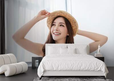 Portrait of beautiful smile healthy armpit asian woman body curve summer casual wear with hat. People beauty perfect body slim fitness girl. Freedom happy relax lifestyle healthcare concept Wall mural