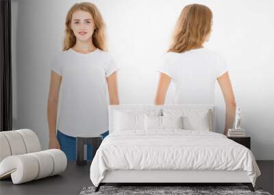 Front and back views of young caucasian girl woman in stylish t-shirt on white background. Mock up for design. Copy space. Template. Blank Wall mural