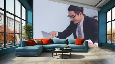 business success concept : happy marketing businessman working online technology professional office Wall mural