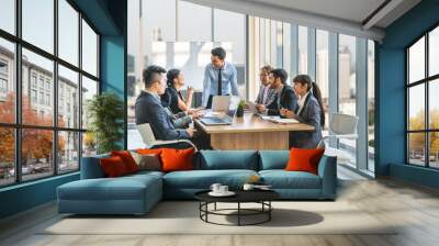 Businesspeople discussing together in conference room during meeting at office. Wall mural