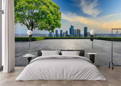 empty city square and green tree with modern city skyline scenery Wall mural