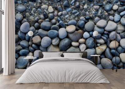 smooth round pebbles texture background pebble sea beach close up dark wet pebble and gray dry pebble high quality photo Wall mural