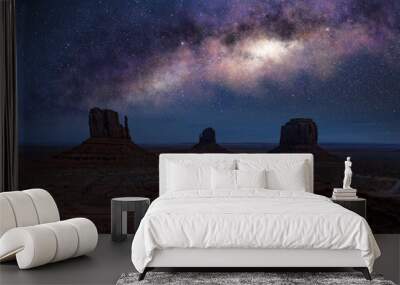 The arch of Milky way in Monument Valley. Arizona iconic landscape at night. Wall mural