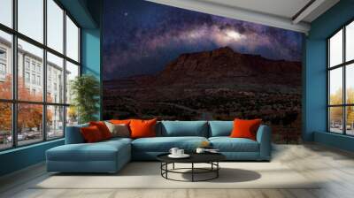 The Milky Way galaxy over a desert road in sothwest US. Wall mural