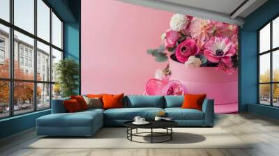 Blooming Elegance: A Hat Round Box of Flowers on Pink Background Wall mural