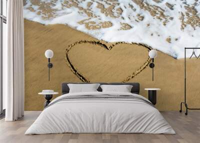 Heart drawn on beach sand Wall mural