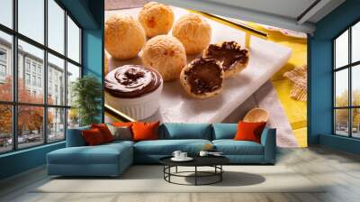 Brazilian snack cheese bread stuffed with chocolate. Wall mural