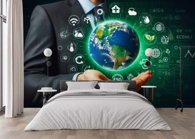 Businessman's hand holds green planet with ESG, net zero, carbon co2 and net zero icons. environmentally friendly carbon saves our planet, world environment day, earth day and climate change Wall mural