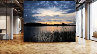 Beautiful sunset at the lake. Poland, Masuria - the land of a thousand lakes. Wall mural