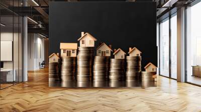 Mini house on stack of coins. Concept of Investment property. Wall mural