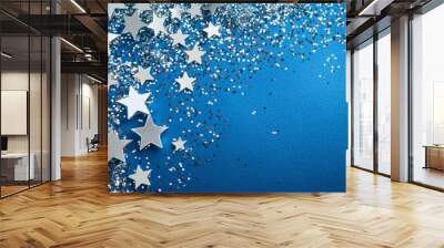 New Year or Christmas Top view of surreal paint brush drawing silver stars confetti with copy space blue color background minimal style. Wall mural