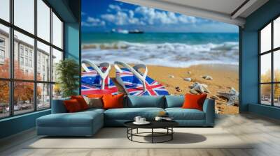 Patriotic UK background with flip flops on the sandy beach Wall mural