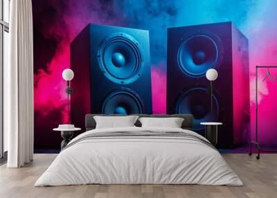 Two sound speakers and subwoofer on dark background with neon lights. Set for listening music. Audio equipment Wall mural