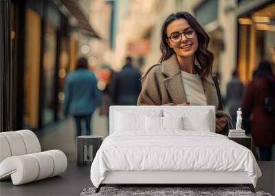 Woman in shopping. Happy woman with shopping bags enjoying in shopping. Consumerism, shopping, lifestyle concept Wall mural