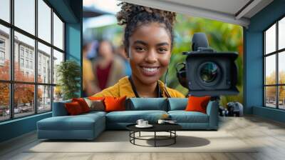 Young african american woman journalist pointing reporter microphone to the camera for television news Wall mural