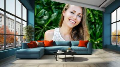 Beautiful smiling girl close up portrait Wall mural