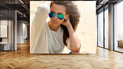 Fashion portrait of a beautiful woman in sunglasses - close up Wall mural