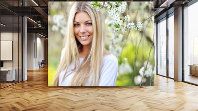 Portrait of young beautiful woman, on green background summer na Wall mural