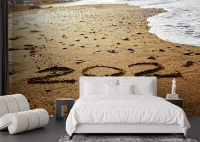 Happy new year 2021 text on the sea beach. Abstract background photo of the upcoming new year 2021 Wall mural