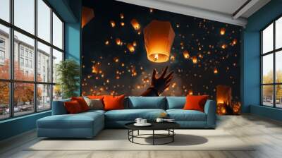 Releasing sky lanterns In the quiet night The concept of the tradition of releasing floating lanterns Wall mural