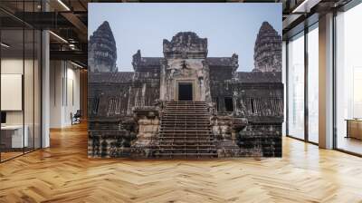 Ancient architecture and ruins of Angkor Wat early in the morning. Wall mural