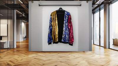 single multicoloured sequin party cardigan on clothes rail in empty white wardrobe or closet Wall mural