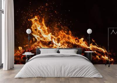 fire flames with sparks on black background Wall mural