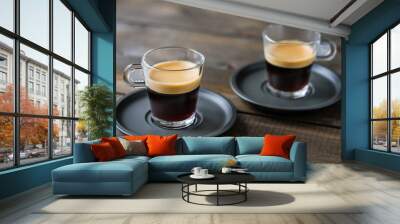 Two cups of espresso on a wooden table Wall mural