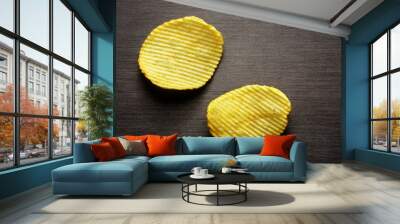 Chips potato on a black background Wall mural