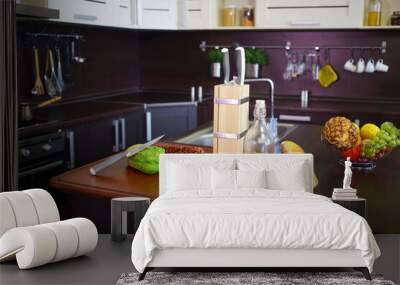 Empty kitchen with brown table with bread, oil, fruits, sink, modern stove Wall mural